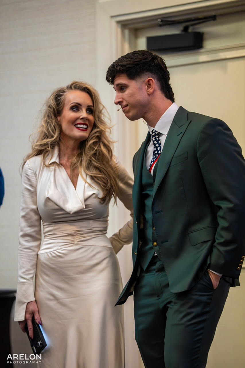 Luke in conversation with a guest at the ICAN Summit